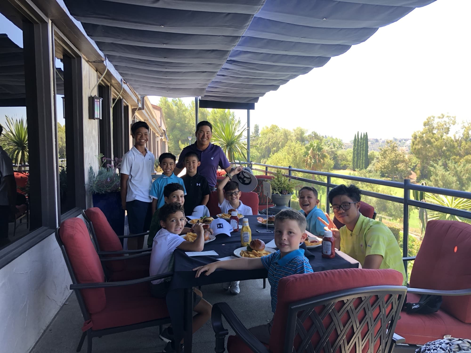 Jucchou Golf Nike camp juniors taking a lunch break together